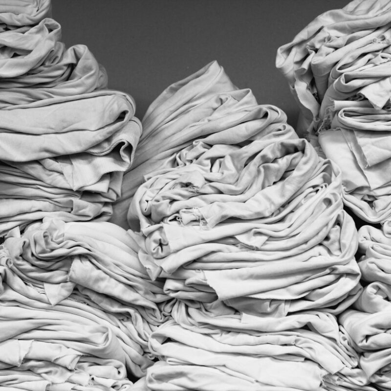 Piles of fabric in black and white