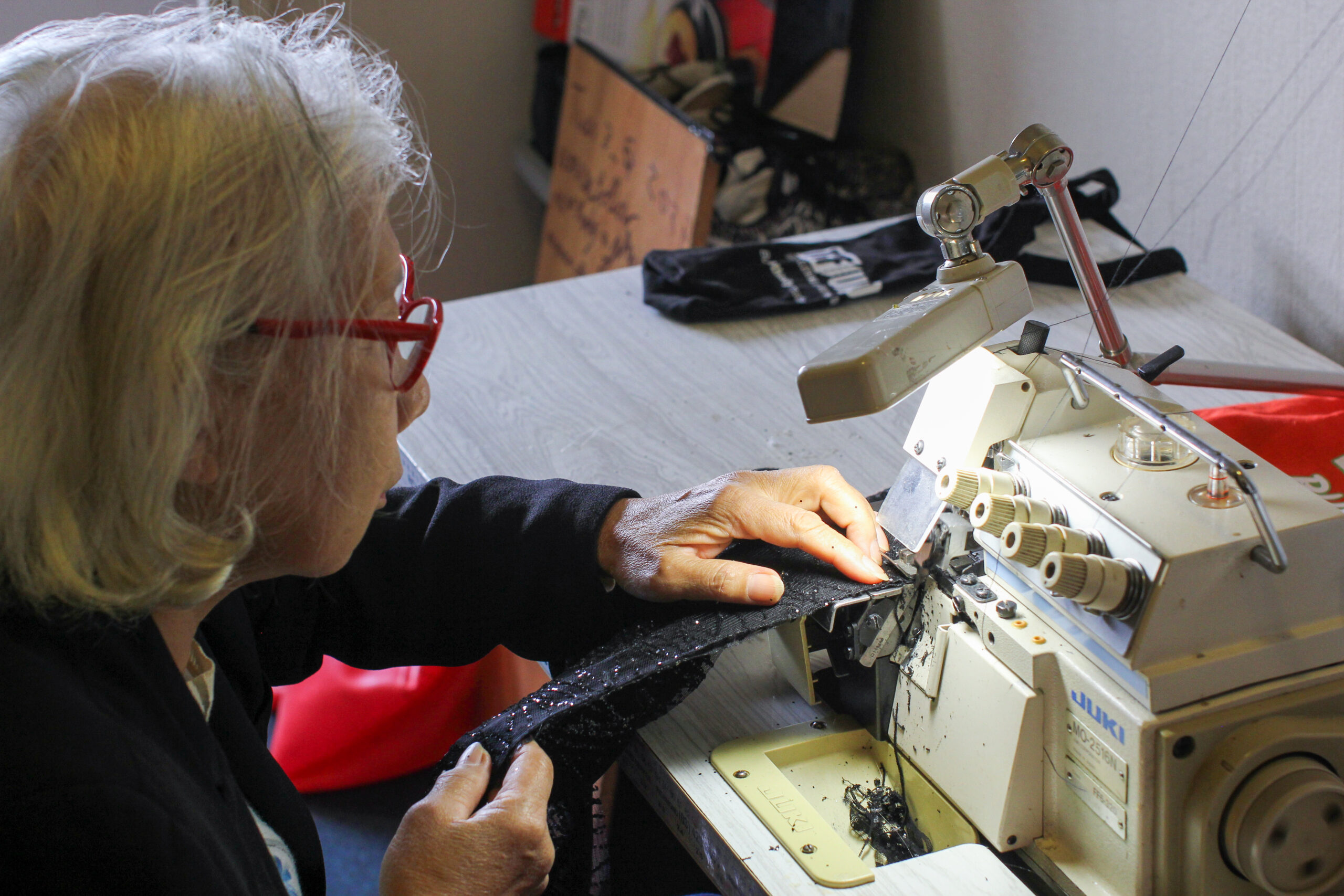 Outworker sewing a garment